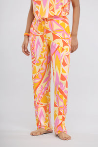 Yellow paisley modal pajama pants with vibrant pink and orange patterns.