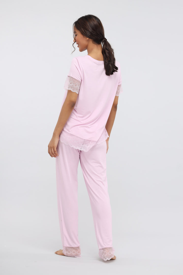 Soft pink lace modal pajama set, cozy and stylish, perfect for relaxation.