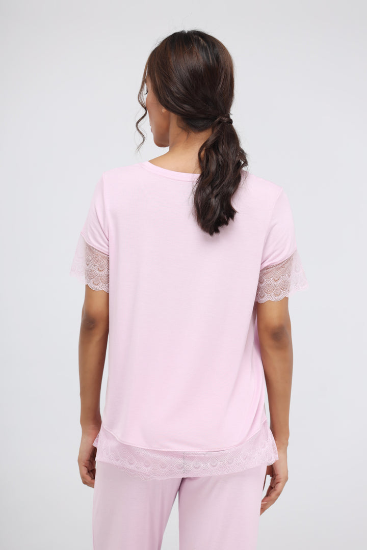 Soft pink modal lace top worn from the back, stylish and comfortable.