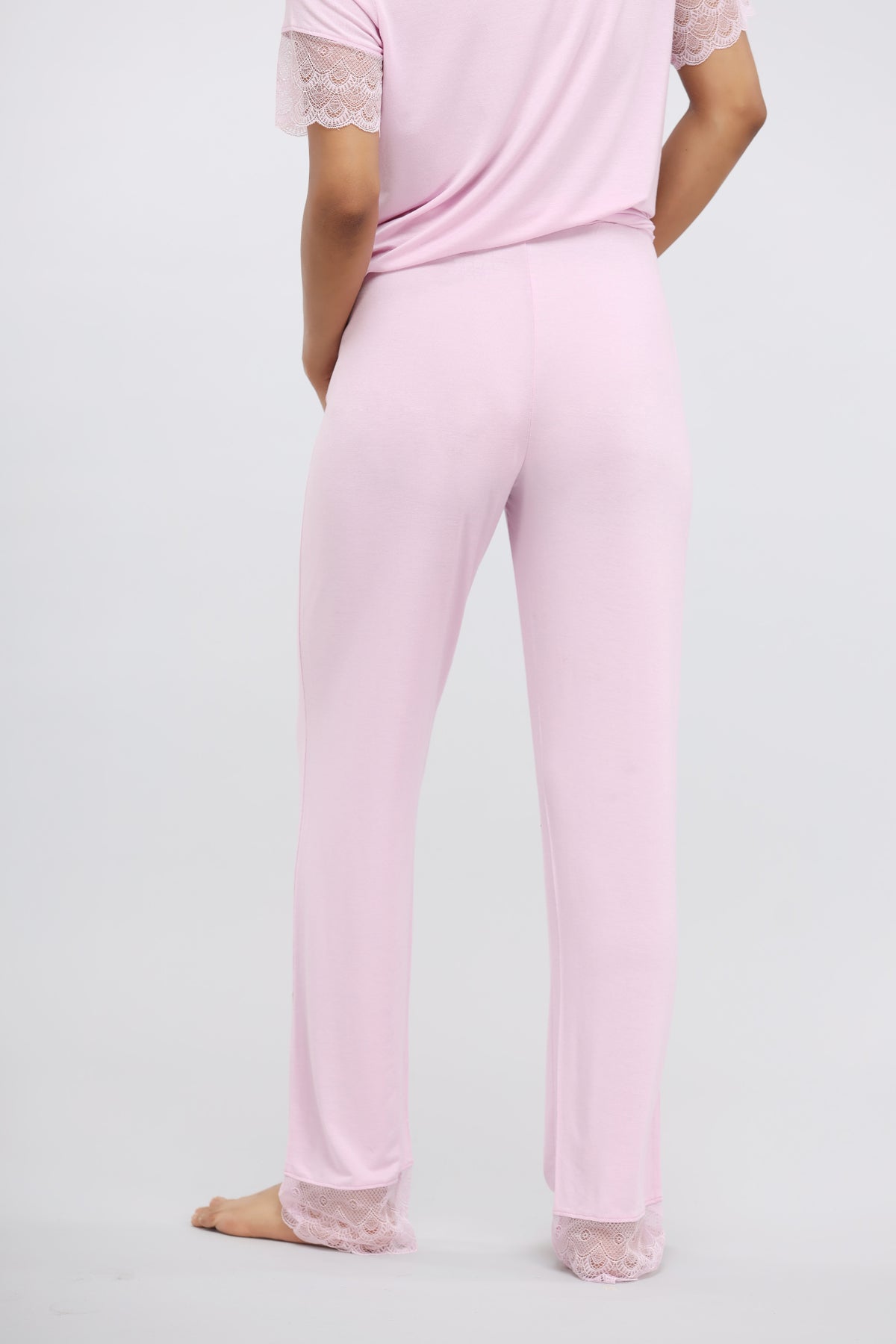 Soft pink modal lace pajama set with elegant lace detailing.