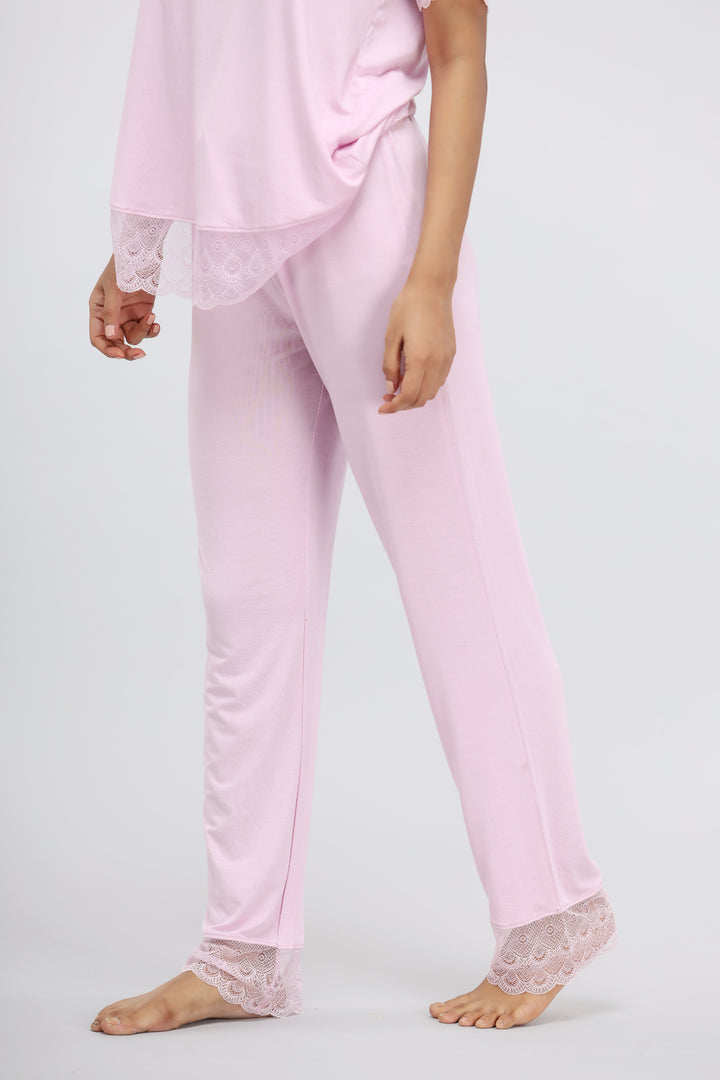 Soft pink modal lace pajama set for comfortable sleepwear.