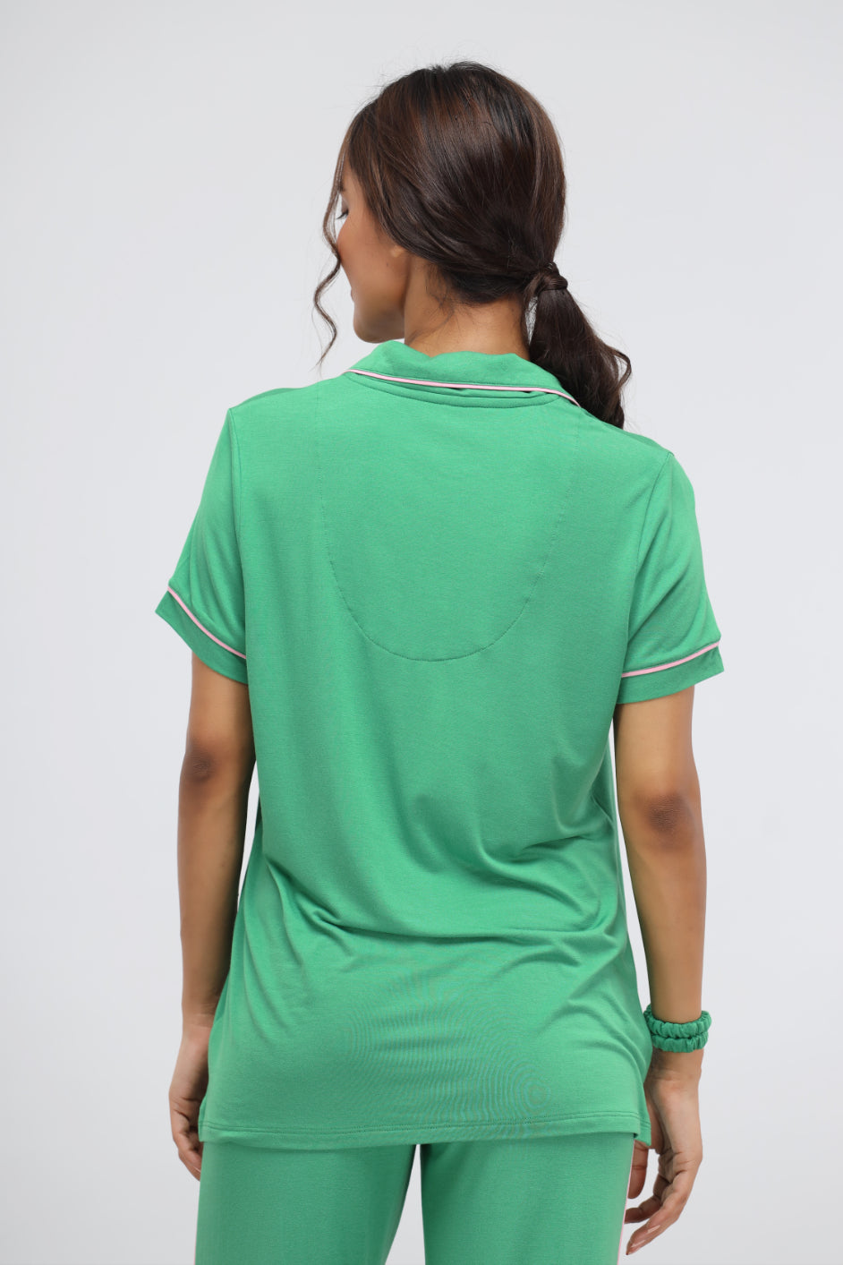 Back view of Green Bee Modal Piping Half Sleeve Top in green.