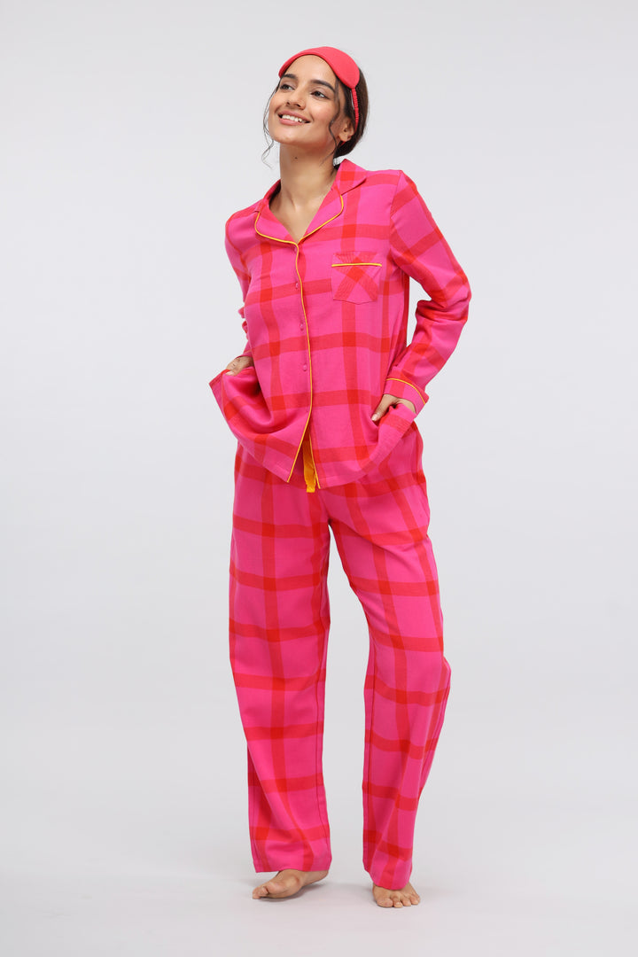 Pink soft cotton plaid pajama set for cozy lounging.
