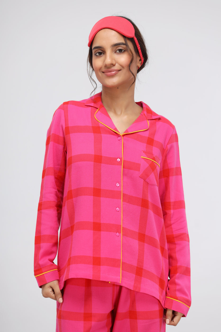 Pink soft cotton plaid button-down shirt with contrasting yellow detailing.