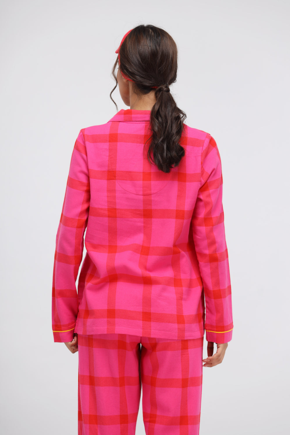 Pink soft cotton plaid button down shirt, stylish and cozy back view.