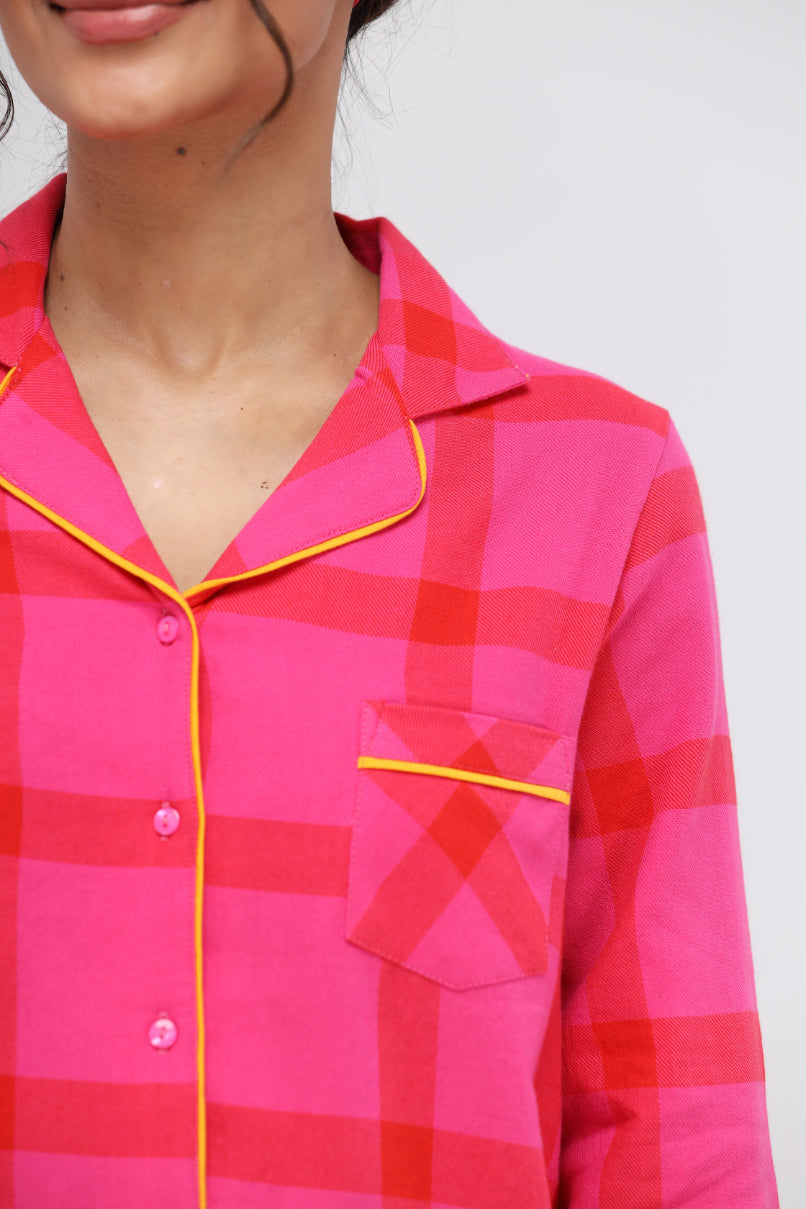 Pink soft cotton plaid button down shirt with yellow details.