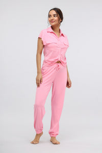 Sachet Pink Supima® Jogger Set worn by a smiling model.