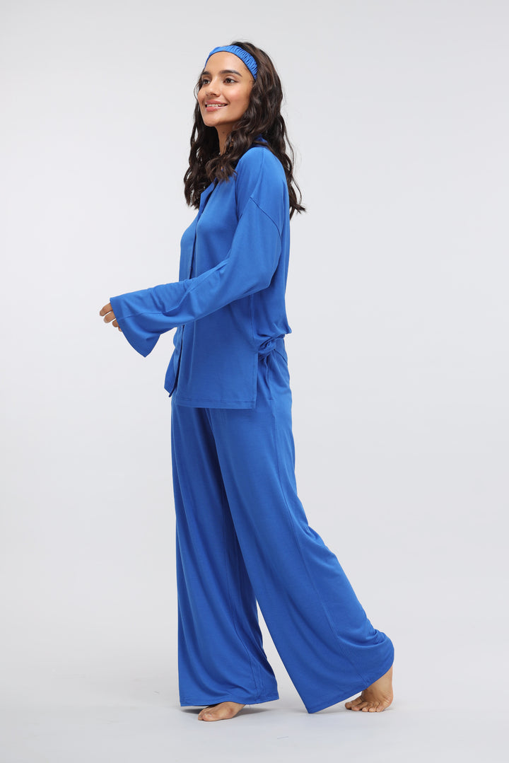 Model wearing Olympian Blue Modal Long Button Down Slit Top outfit.