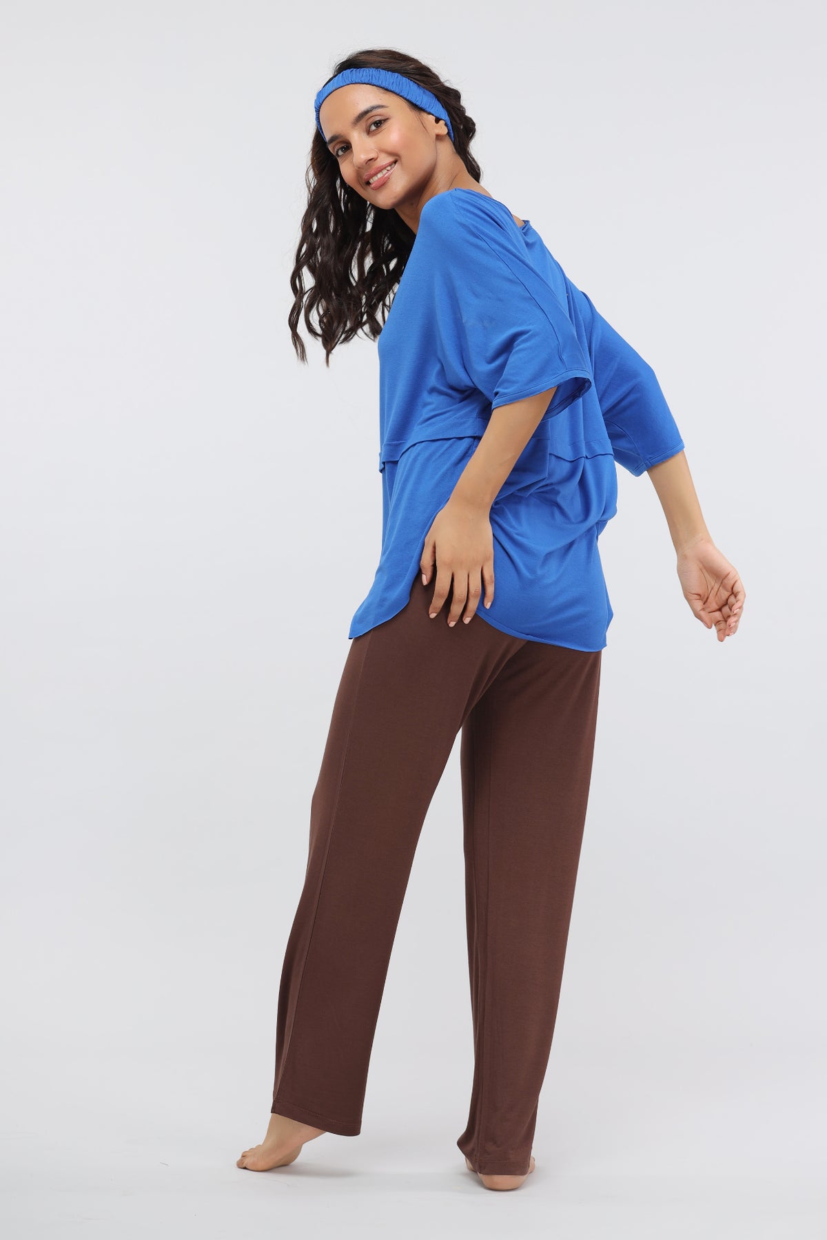 Olympian Blue Modal Oversized Lounge Top with brown pants and matching headband.