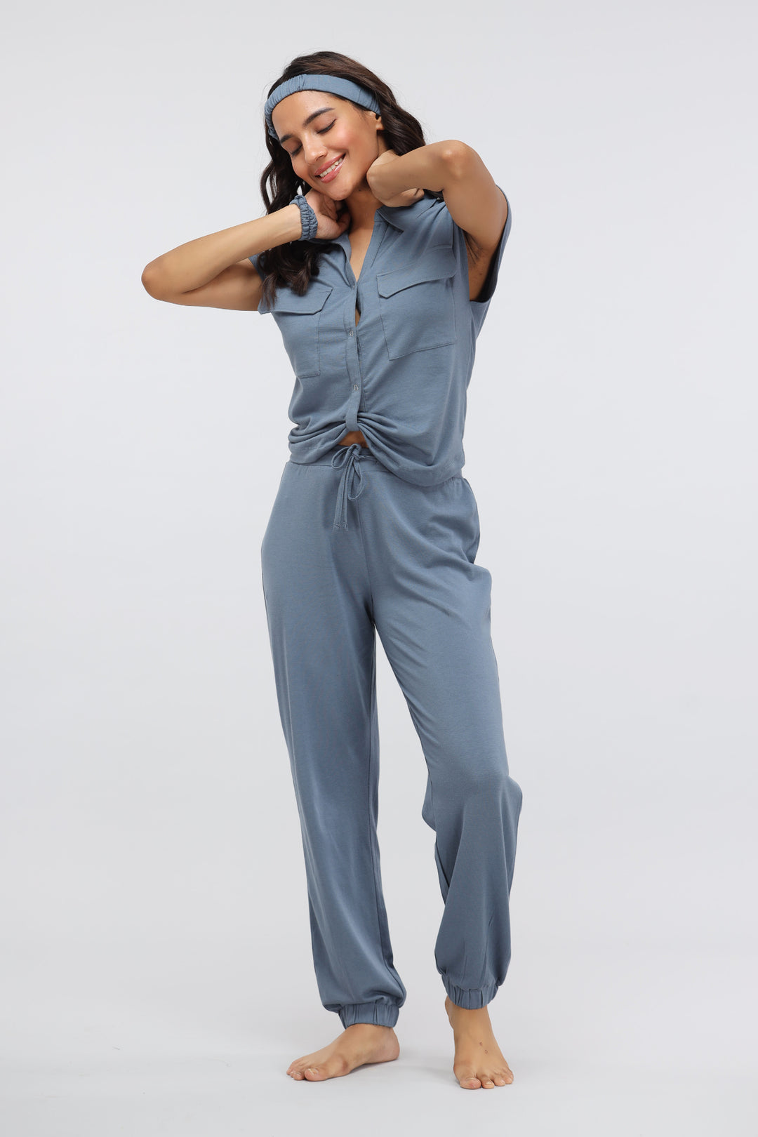 China Blue Supima® collared top model in stylish comfortable outfit.