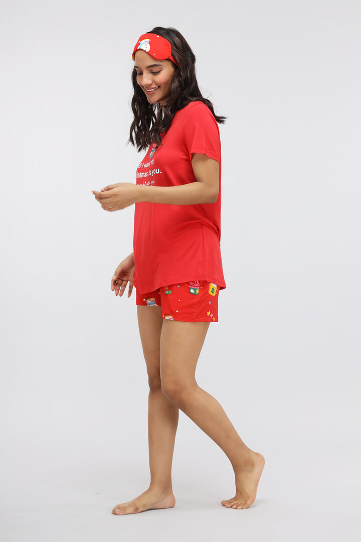 Christmas Cheer Modal Shorts Set worn by a woman in festive attire.