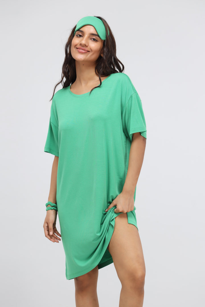 Model wearing a green Bee Modal T-Shirt dress with headband.