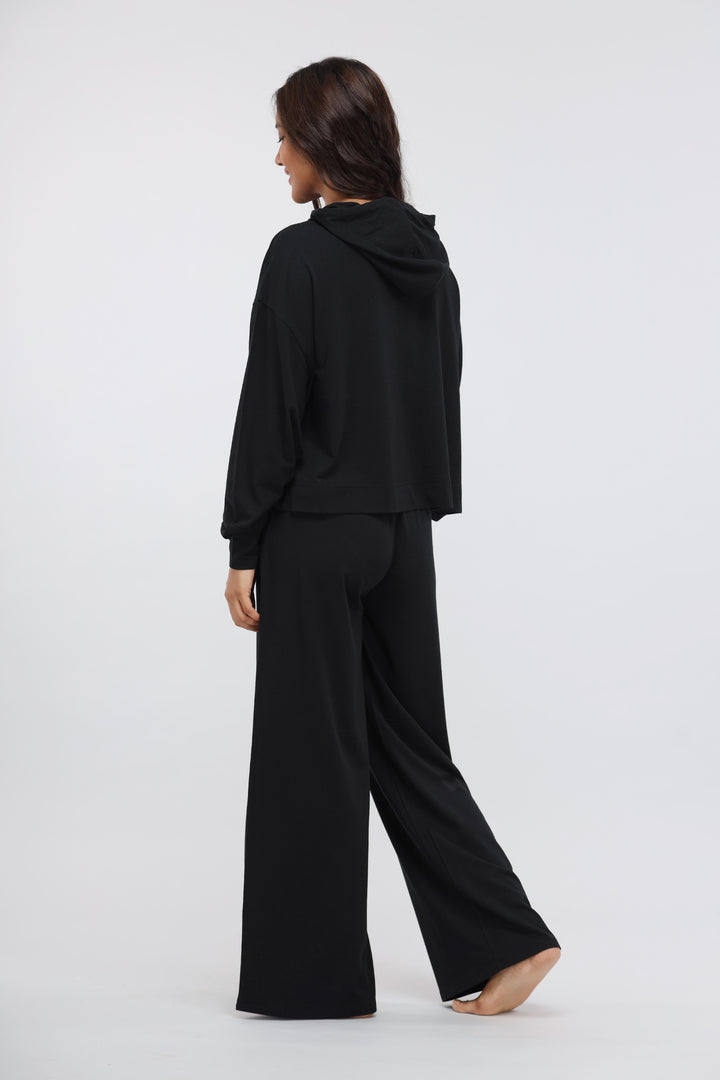 Limited Edition Luxflo Hoodie Set in black, showcasing stylish back view.