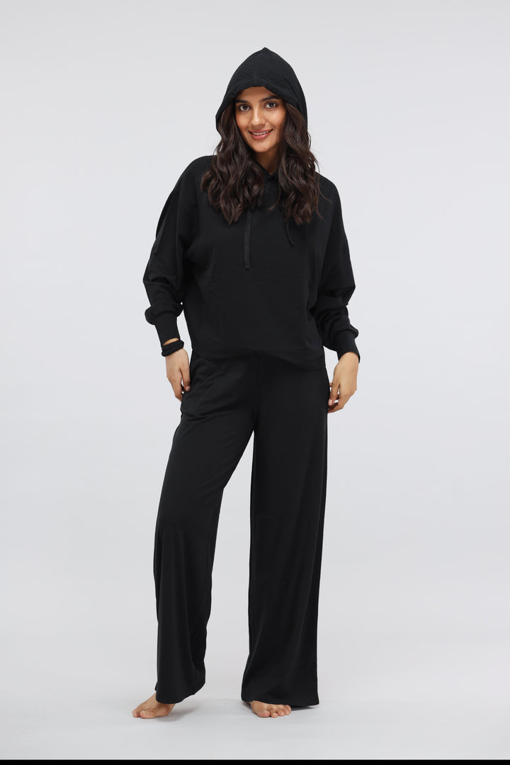 Black Luxflo Travel Hoodie, stylish and comfortable travel apparel for women.
