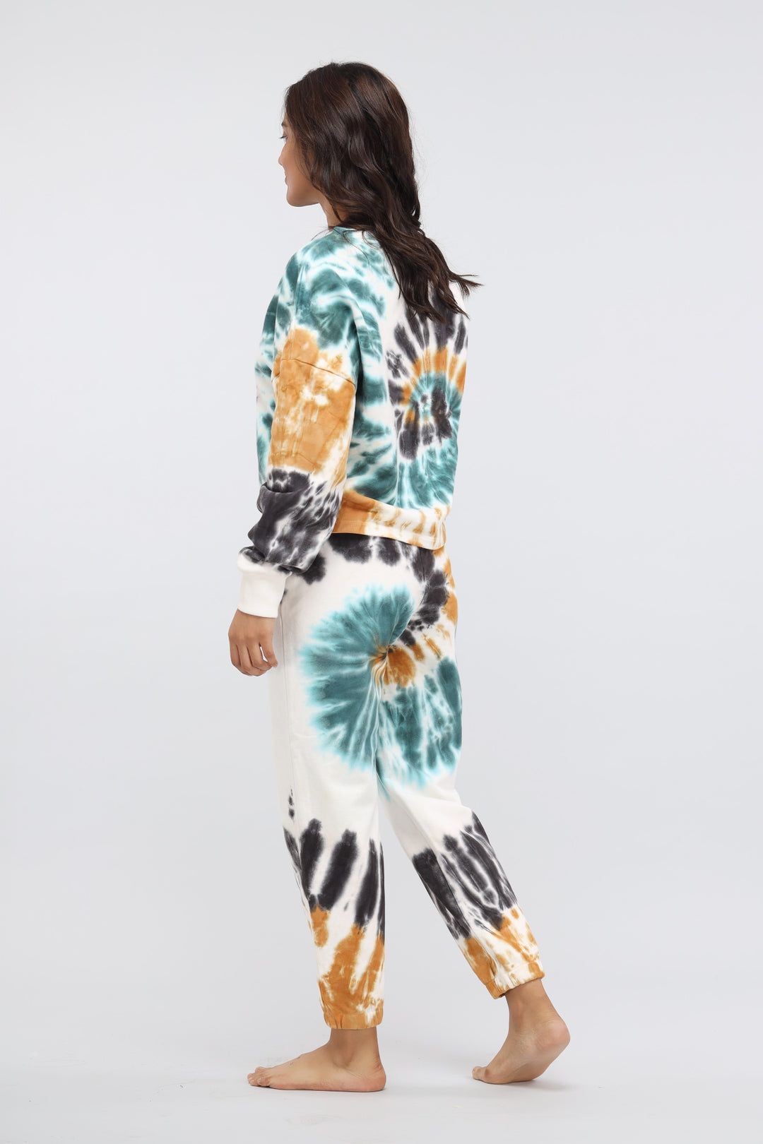 Tie-dye terry jogger set in teal, orange, and black colors.