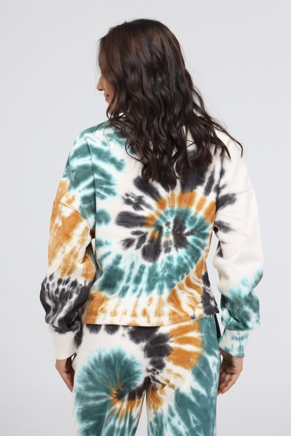 Tie-dye terry travel sweatshirt showcasing vibrant colors and relaxed fit.
