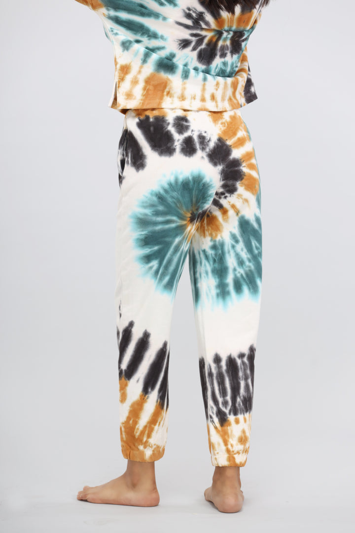 Tie dye terry travel pant in vibrant colors and relaxed fit.