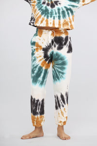 Tie-dye terry travel pants with playful colors, perfect for casual wear.