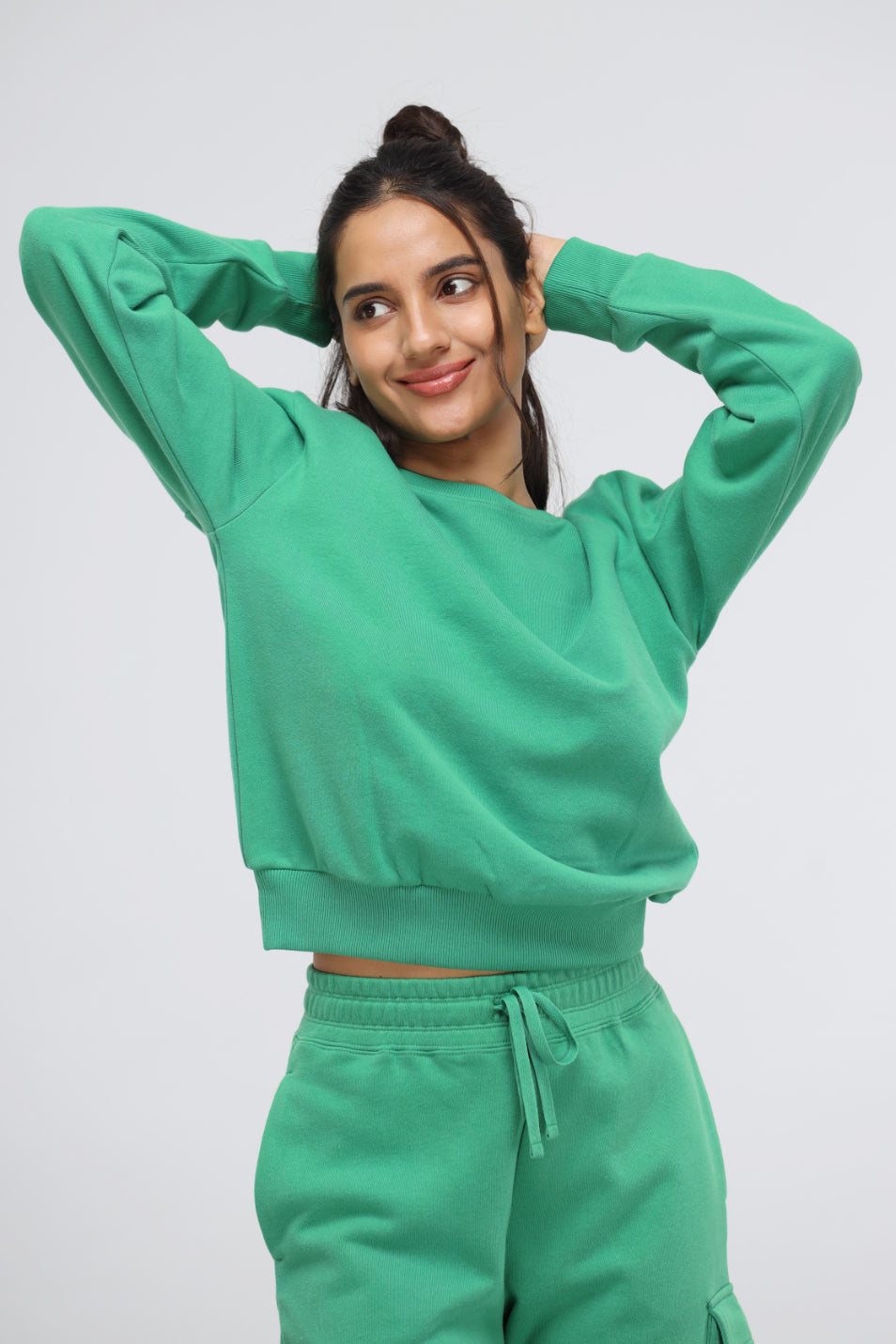 Smiling woman wearing Green Bee Comfy Jogger Set in vibrant green.