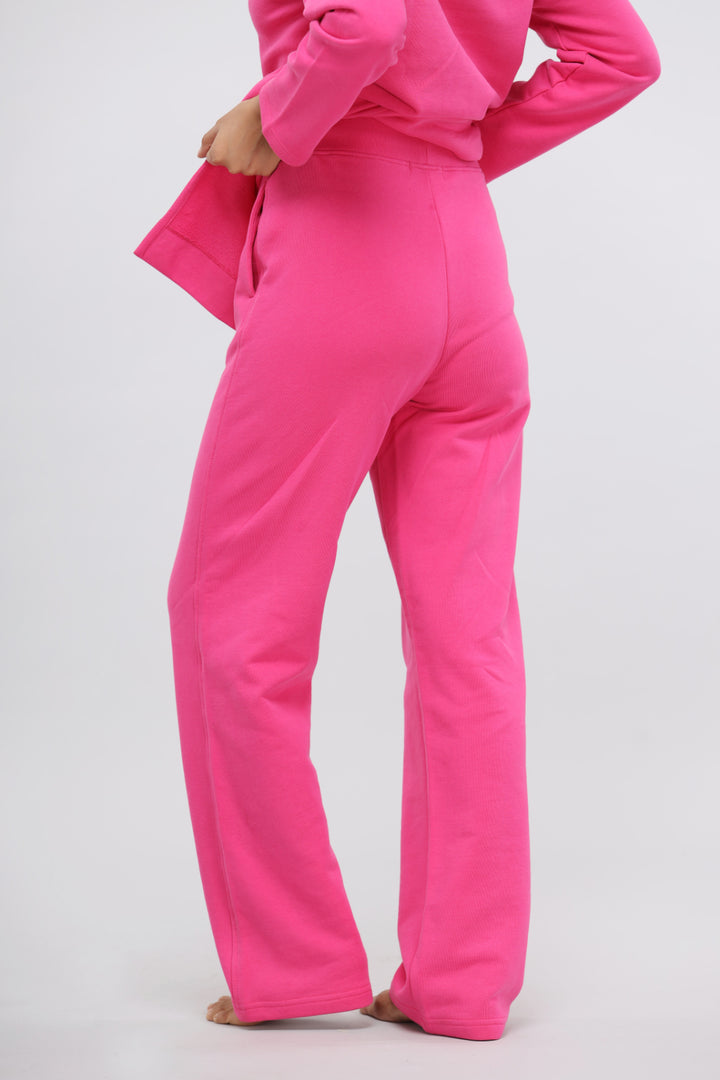 Pink Terry Straight Travel Pant displayed from the back, casual style.