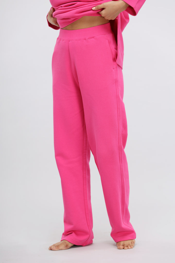 Pink Terry Straight Travel Pant on display for casual travel attire.