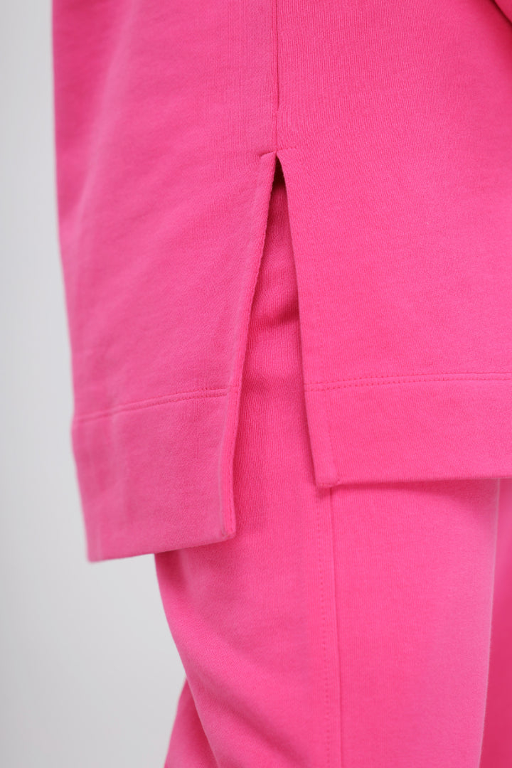 Pink long terry pullover set with stylish side slit details.