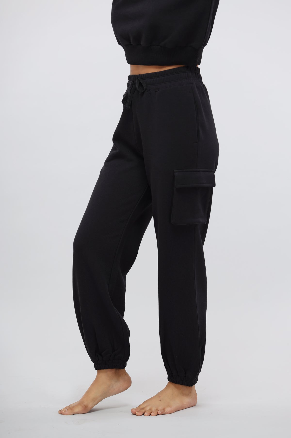 Jet Black Terry Jogger Pants with Patch Pocket for casual comfort.