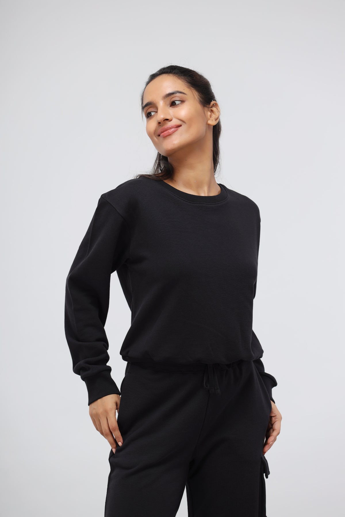 Jet Black Terry Relaxed Sweatshirt model showcasing comfortable casual style.
