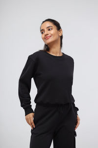 Jet Black Terry Relaxed Sweatshirt model showcasing comfortable casual style.