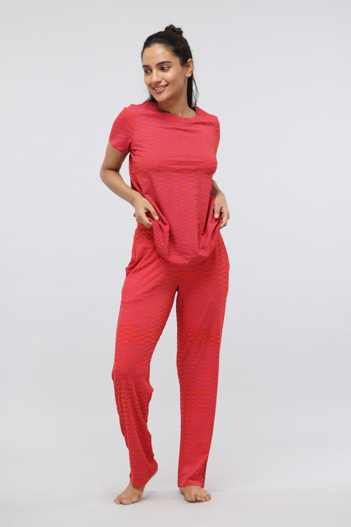 Orange wavy modal printed pajama set for comfortable lounging.