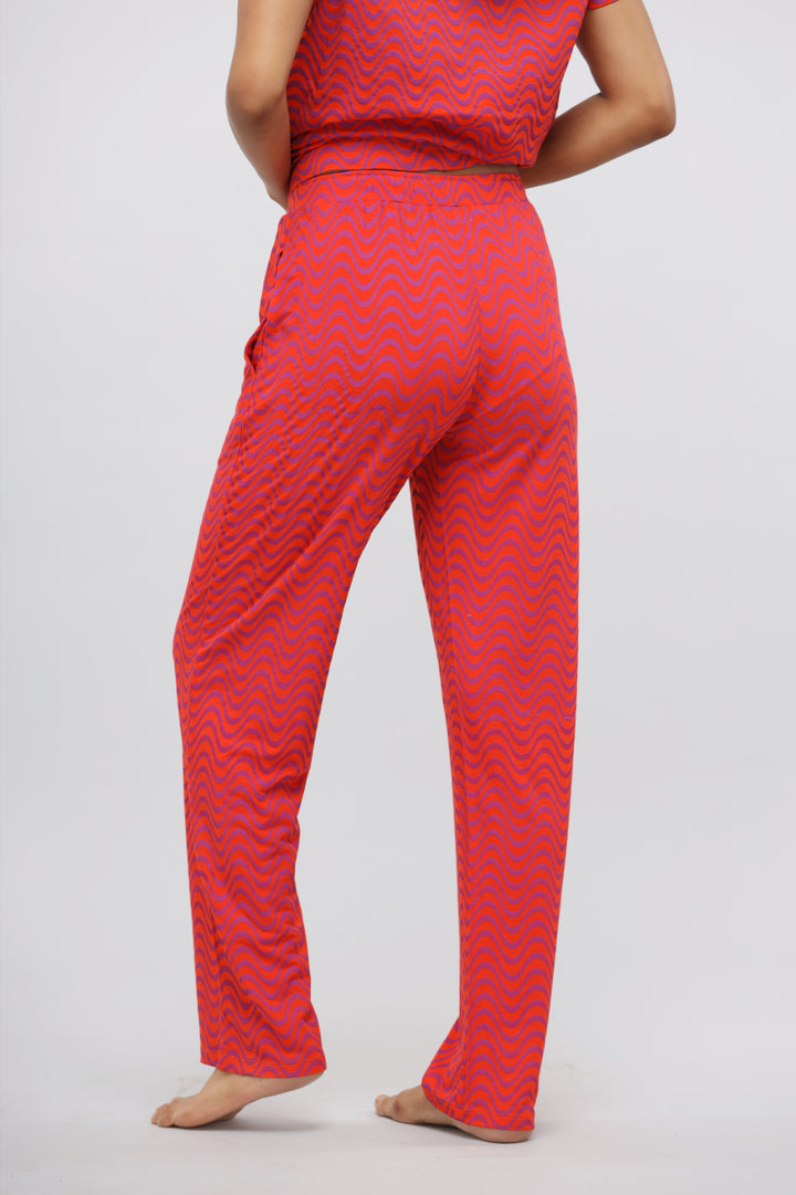 Orange wavy modal printed pajama set, back view, comfortable design.