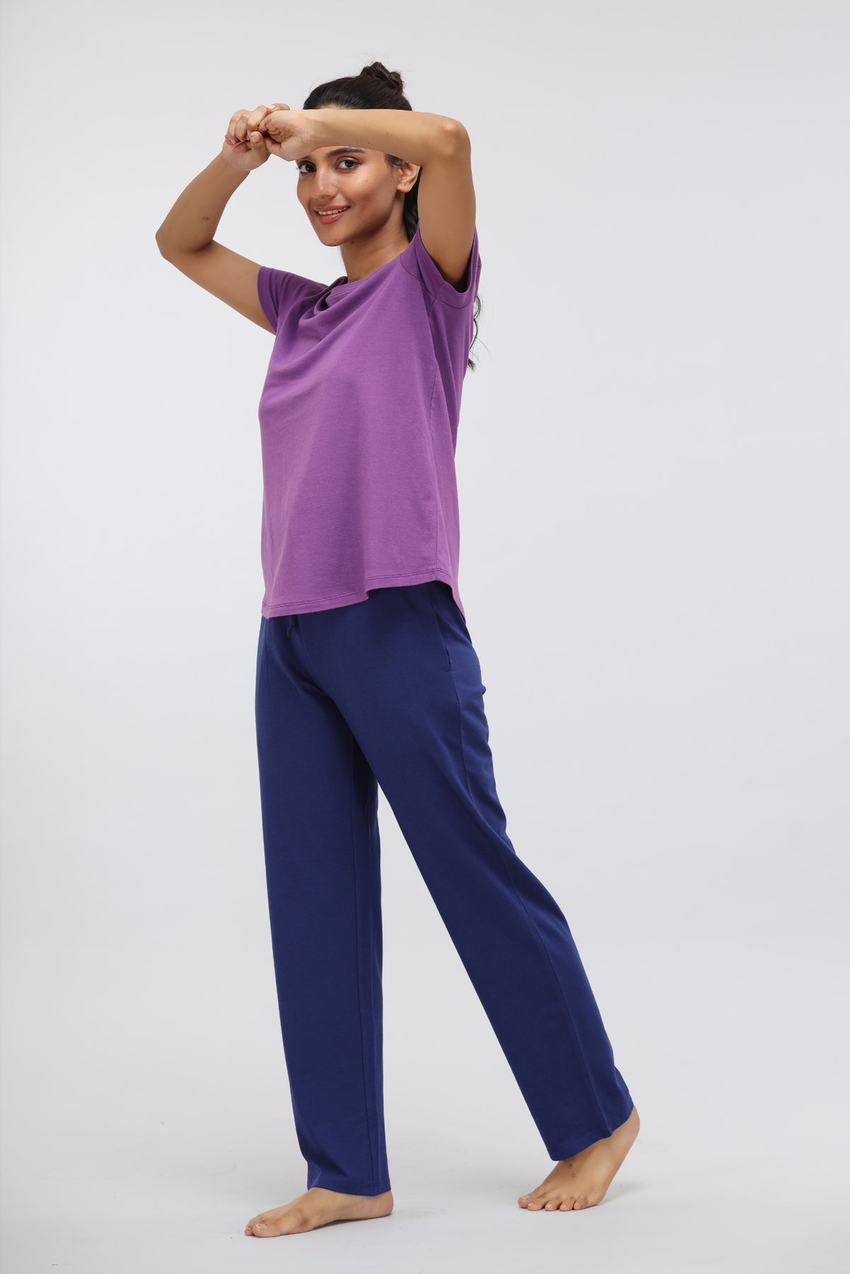 Model wearing Functional Blue Supima® Straight Lounge Pant and purple top.