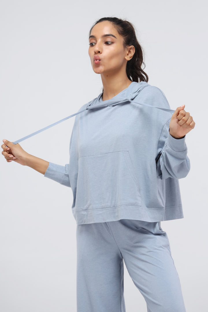 Dusty blue Luxflo travel hoodie with relaxed fit and casual style.