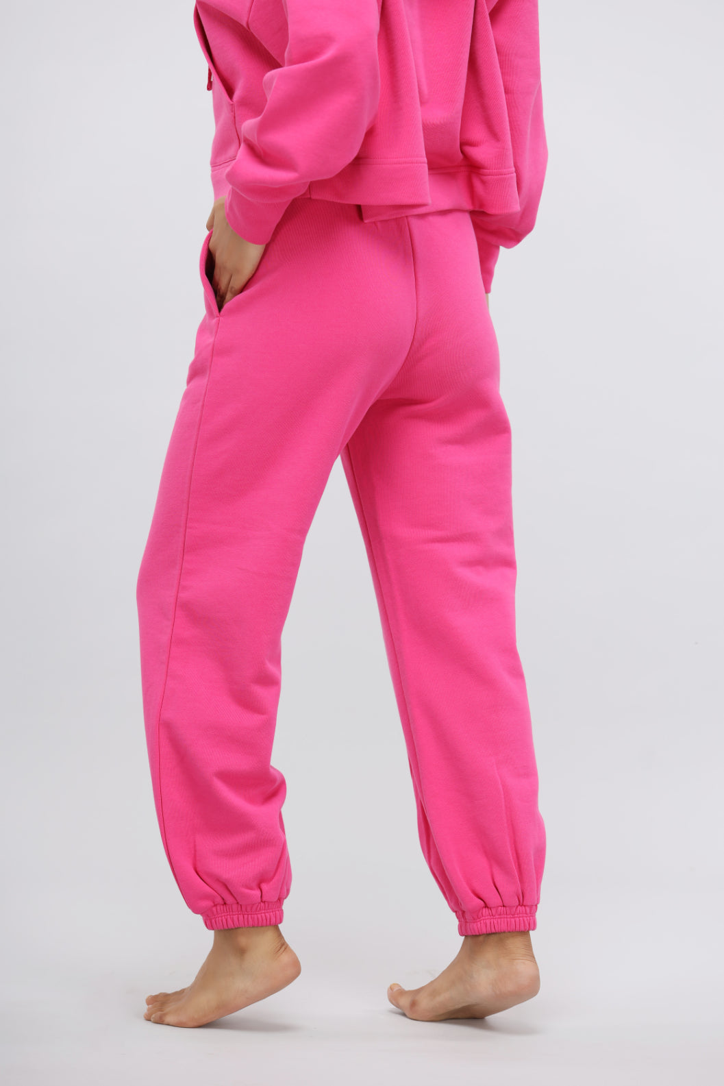 Pink Terry Relaxed Jogger with pockets and elastic cuffs, perfect for comfort.