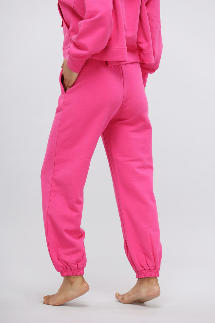 Pink Terry Relaxed Jogger with pockets and elastic cuffs, perfect for comfort.