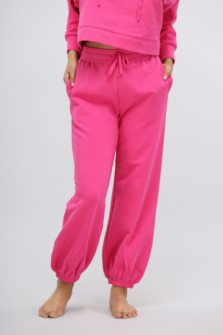 Pink Terry Relaxed Jogger with elastic cuffs and pockets. Perfect for casual wear.