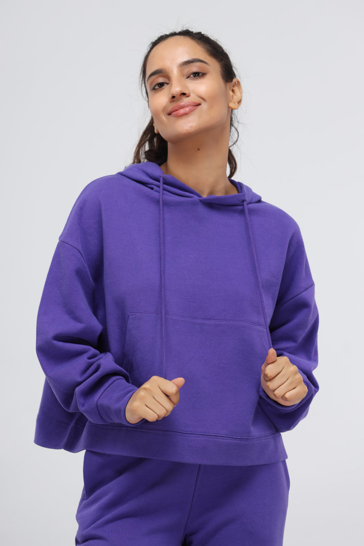 Deep Blue Terry Hoodie Set in purple, model showcasing casual style.