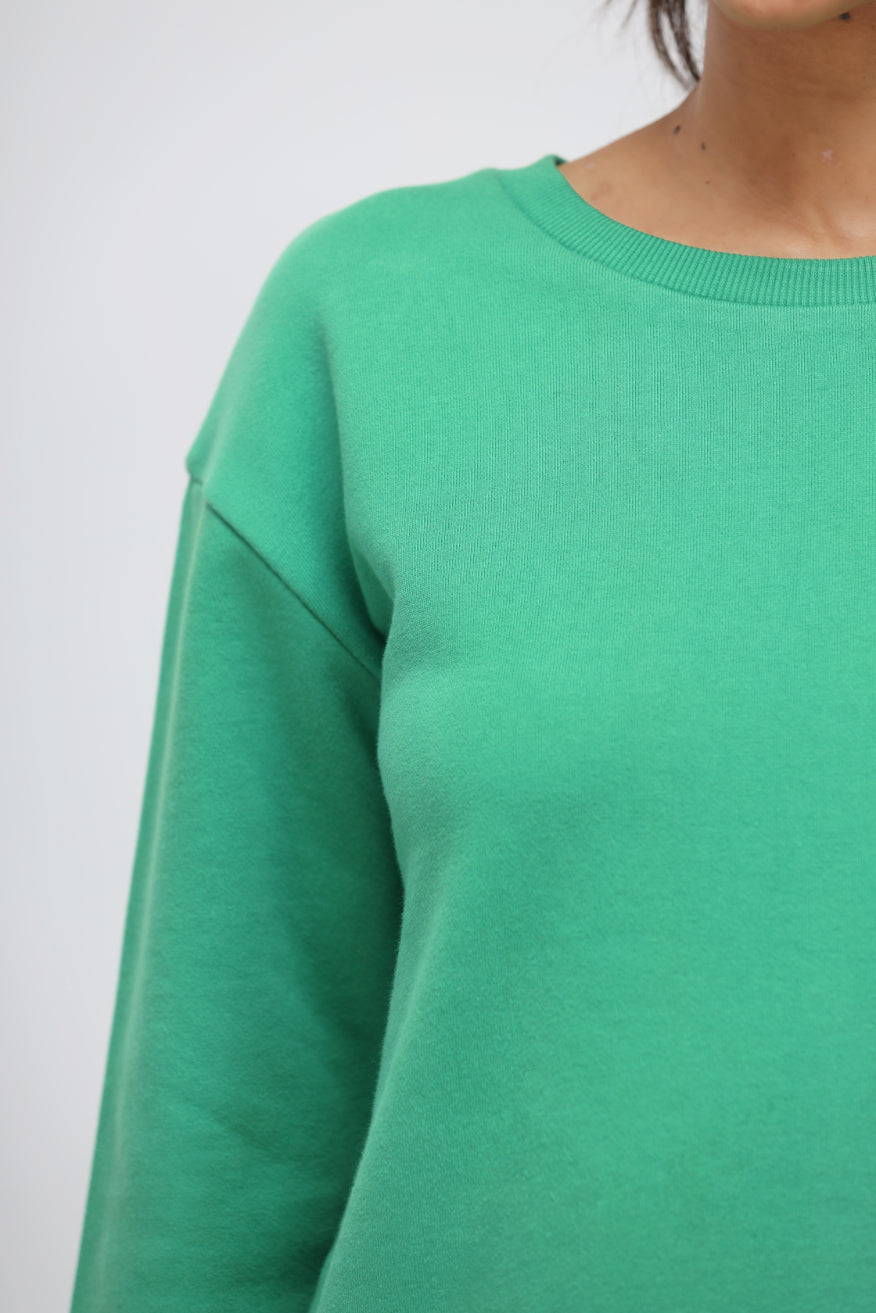 Green Bee Terry Long Pullover close-up, soft fabric, vibrant color.