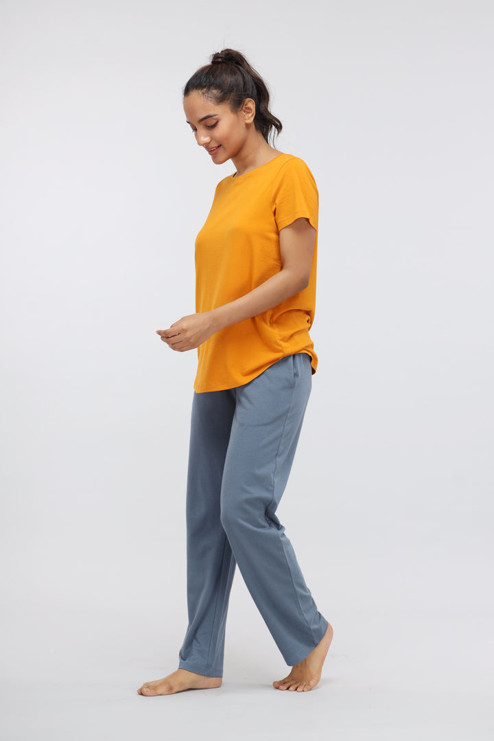 China Blue Supima® Lounge Set featuring a stylish orange top and blue pants.