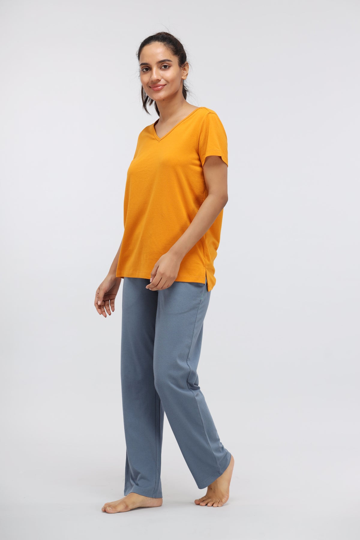 China Blue Supima® straight lounge pant worn with a casual orange top.