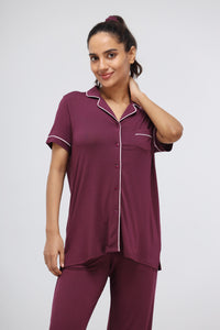 Wine modal piping half sleeve top for relaxed comfort.