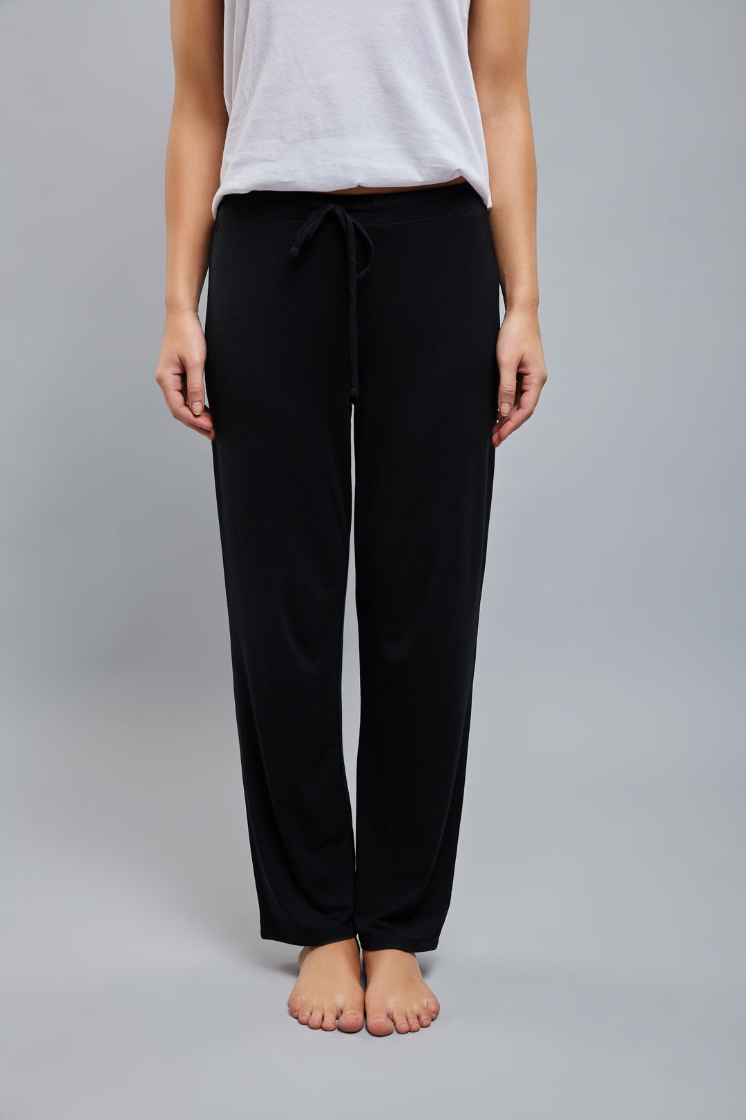 Model wearing black Lazy Lounge Pajamas for ultimate comfort.