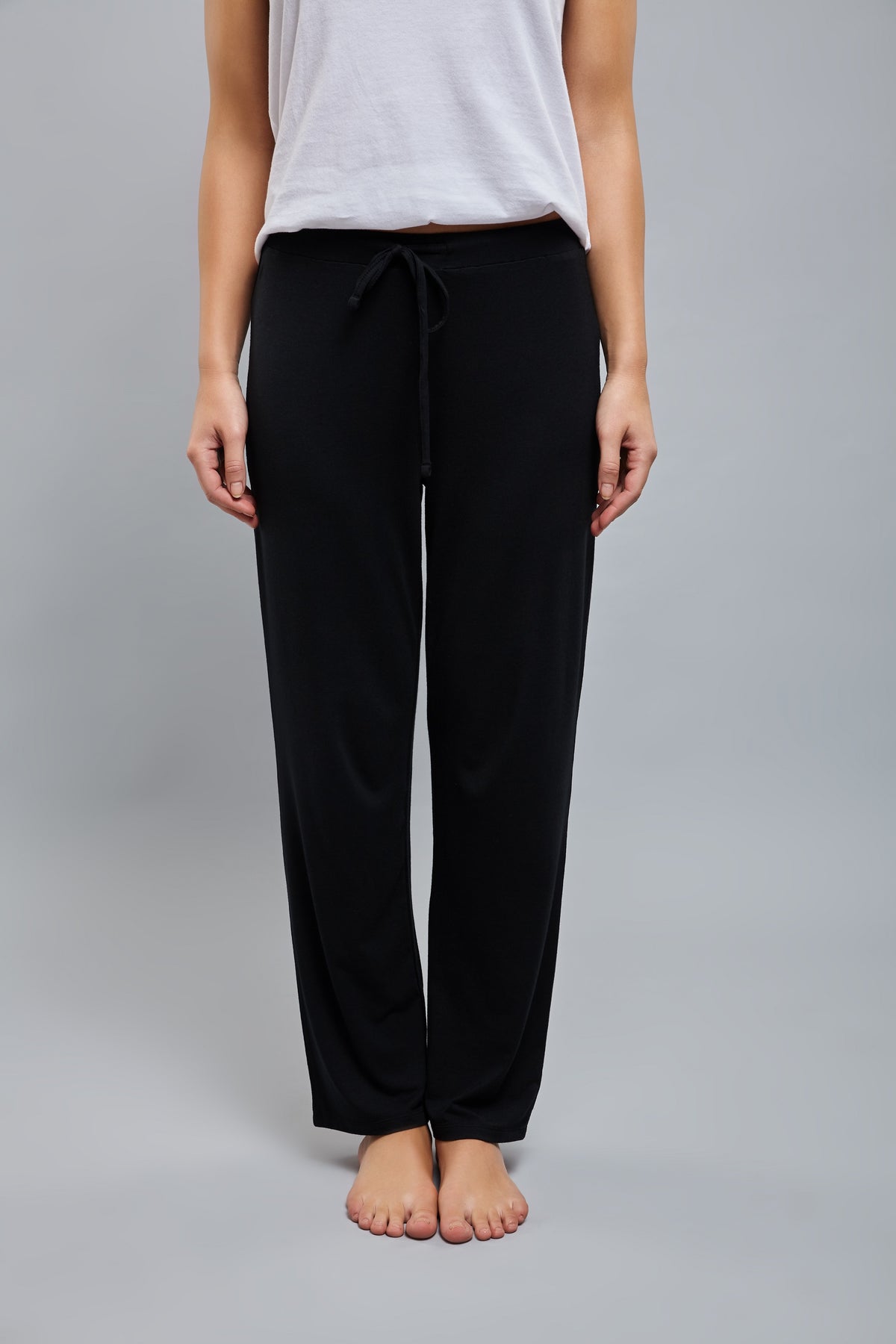 Model wearing black Lazy Lounge Pajamas for ultimate comfort.