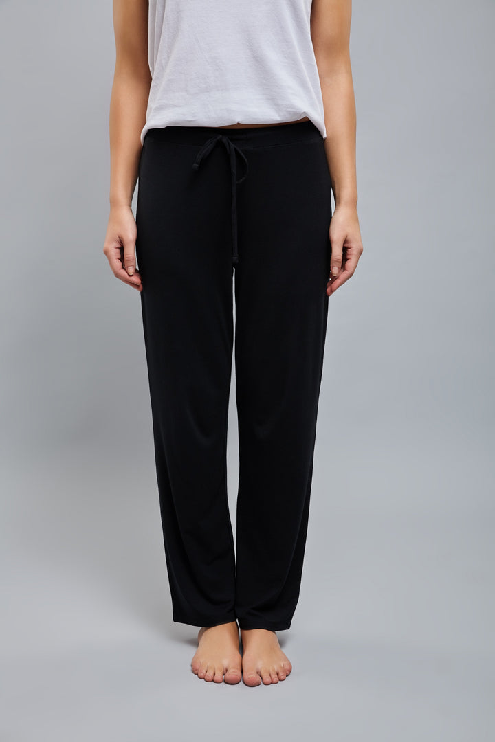 Model wearing black Lazy Lounge Pajamas for ultimate comfort.