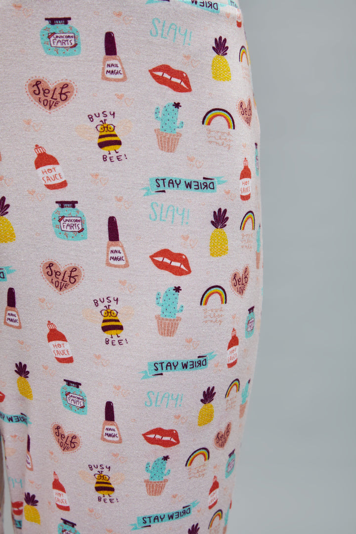 Colorful "Stay Weird Pajamas" with fun, quirky patterns and designs.