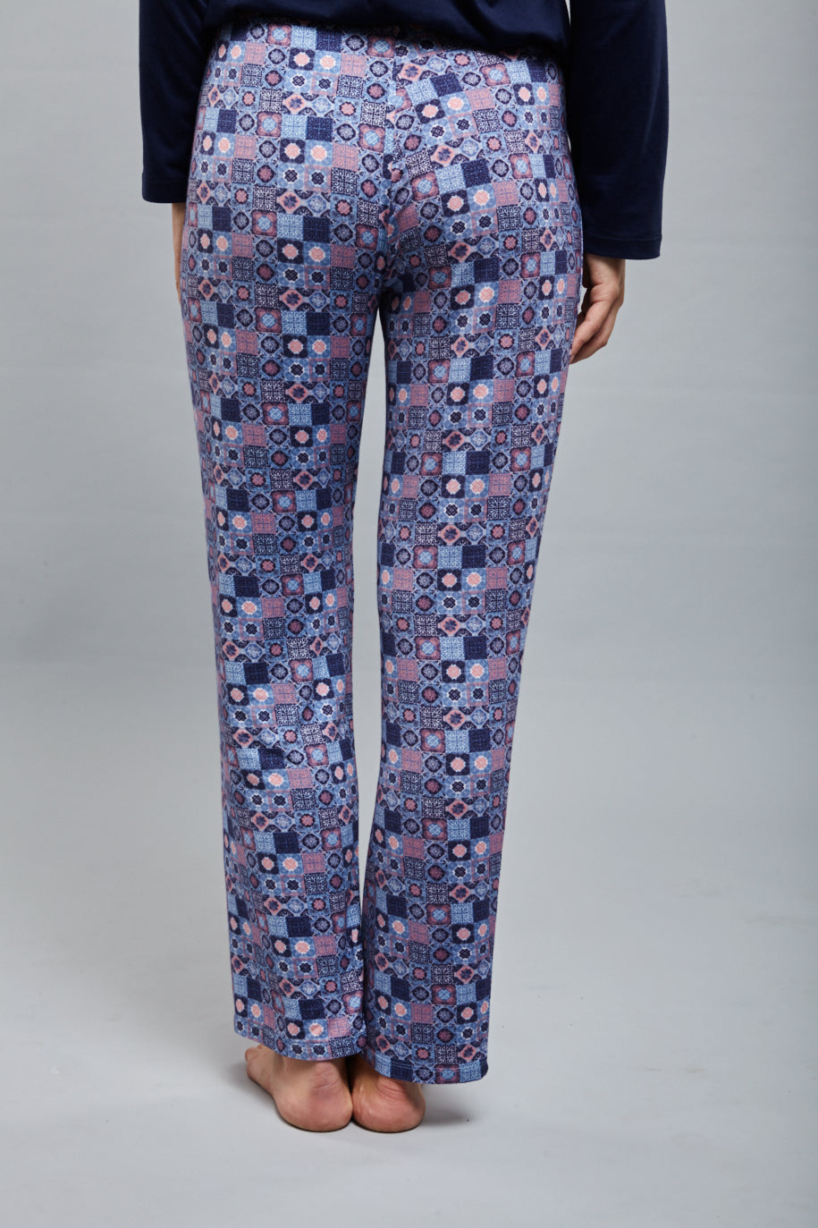 Classic Mosaic Pajamas with colorful patterned pants and a navy top.