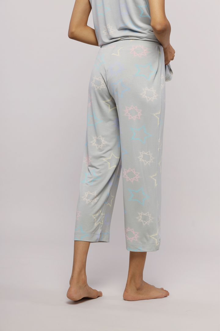 Starlit Capri Set featuring soft, star-patterned pajamas for relaxation.