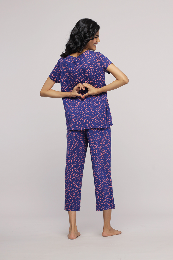 Sweetheart Capri Set featuring playful heart patterns in cozy fabric.
