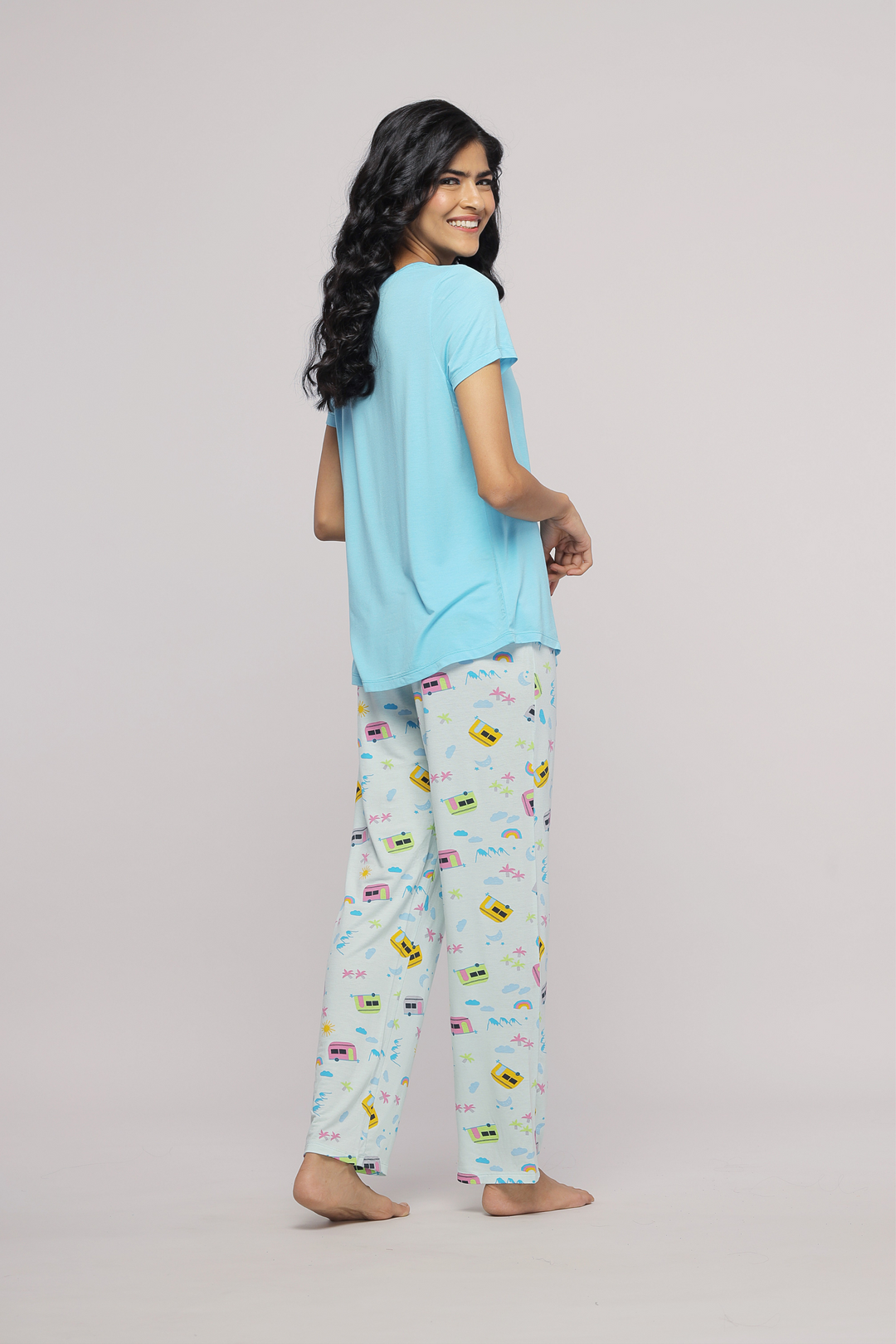 The Voyager Pajama Set featuring a blue top and patterned pants.