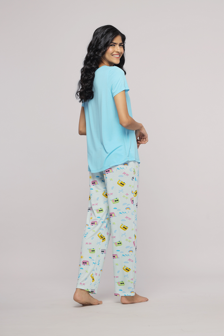 The Voyager Pajama Set featuring a blue top and patterned pants.